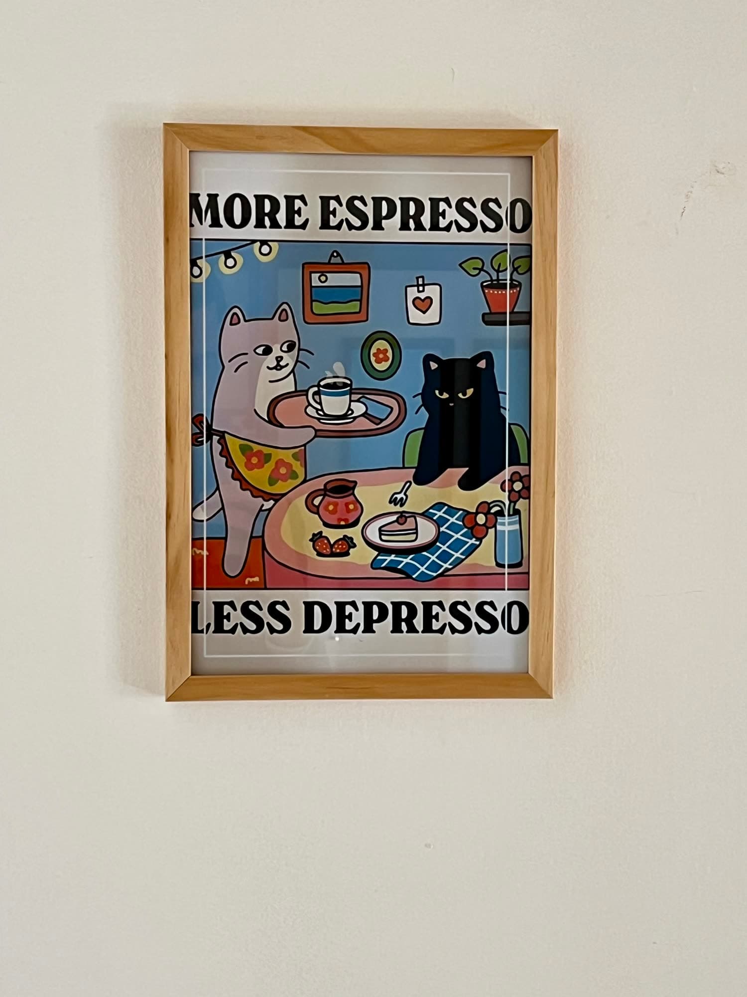 Framed poster on the apartment wall