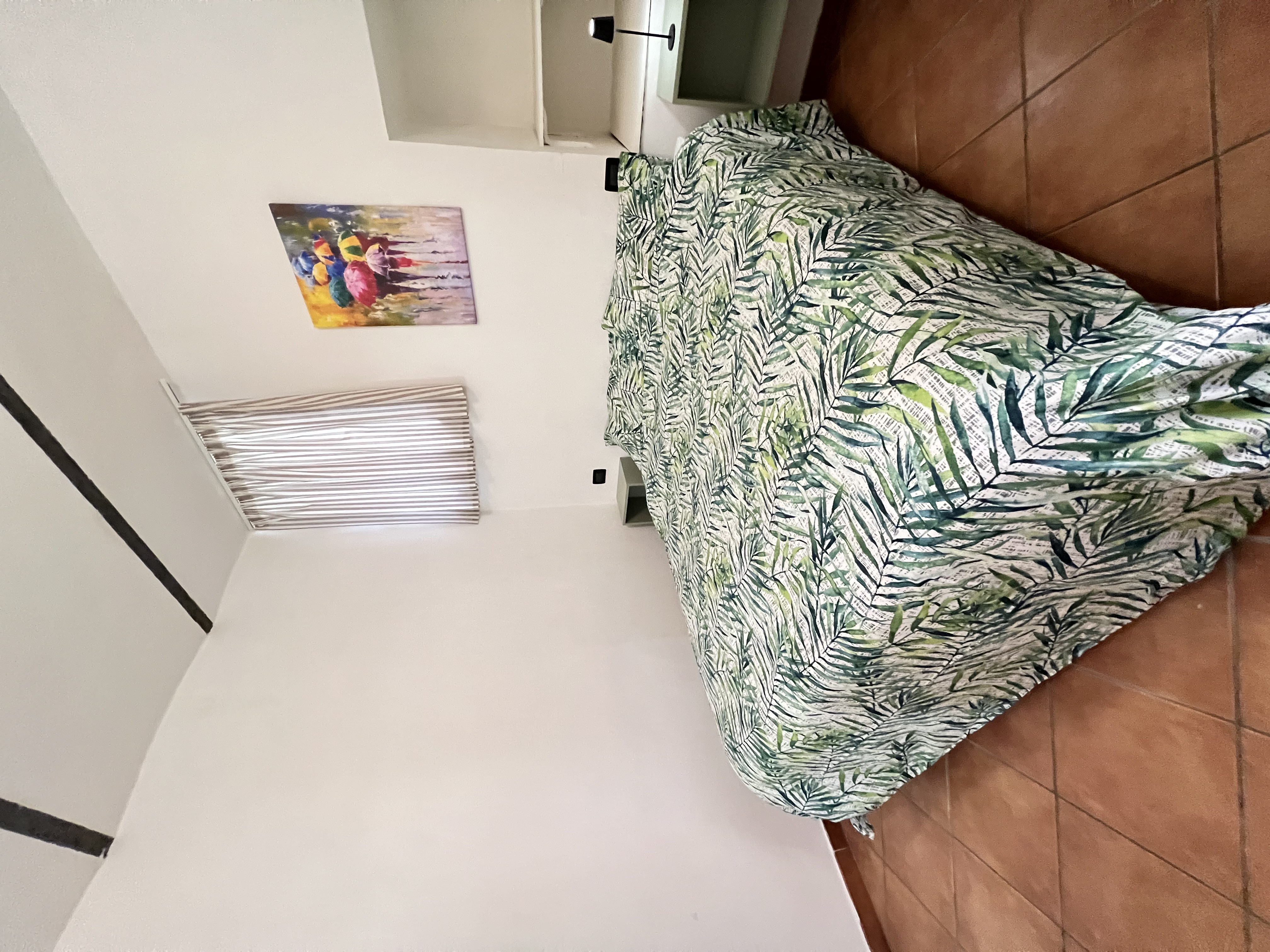 Schlafzimmer mit tropischem Design